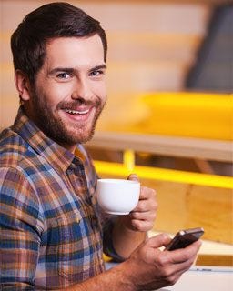 Guy enjoying a cup of coffee